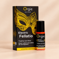 Gloss stimulant Orgie Electric Fellatio 10 ml avec sa boîte, sur fond crème