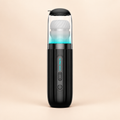 Masturbateur automatique Shockwave Kaotik Labs noir avec lumière LED sur fond crème