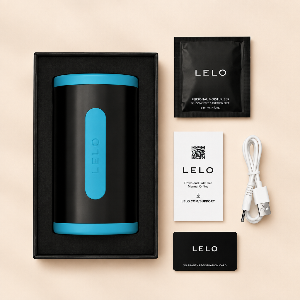 Contenu de la boîte LELO F2S Double Sonic : masturbateur, câble USB, lubrifiant, notice et carte de garantie